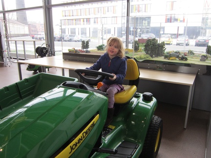 Amelia and big lawn tractor